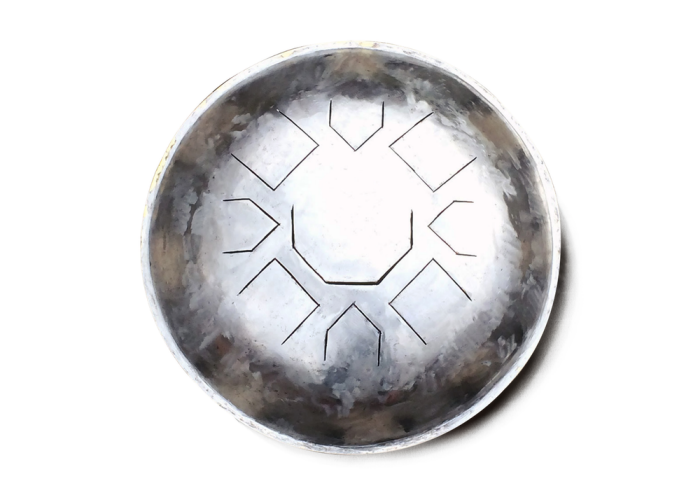 Top view of the finished Mu steel tongue drum showing the full arrangement of cut tongues
