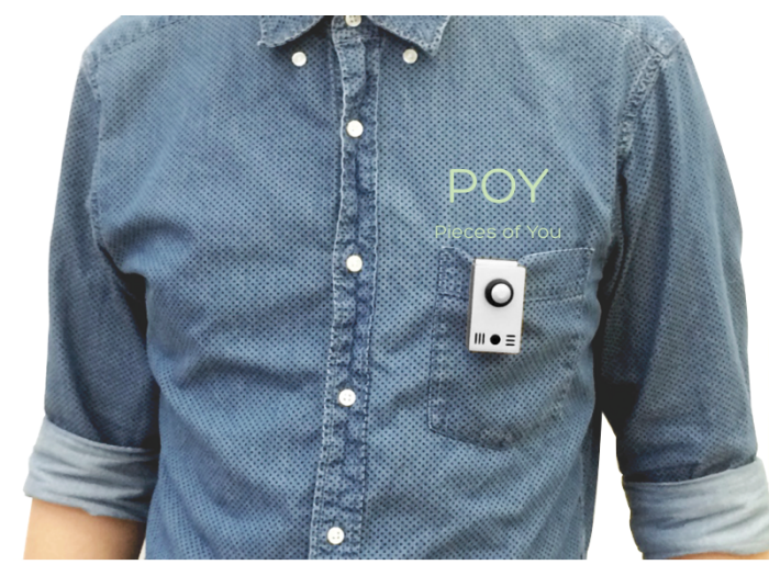 The POY Recorder clipped to the chest pocket of a denim shirt
