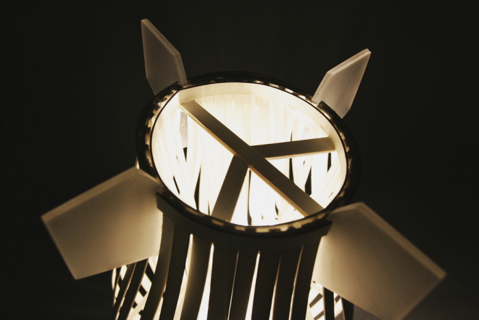 Close view through the top of Peacebomb showing the peace-symbol structure