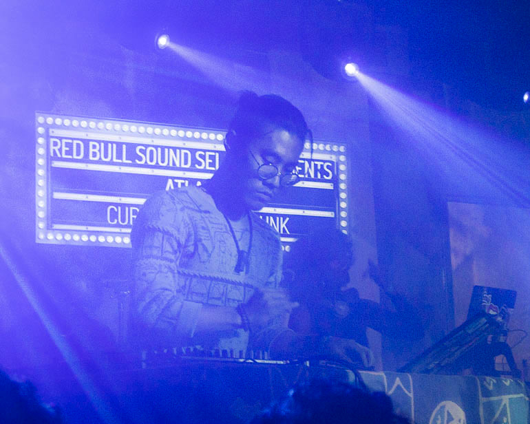 dashMOON performing in front of a lit Red Bull Sound Select sign