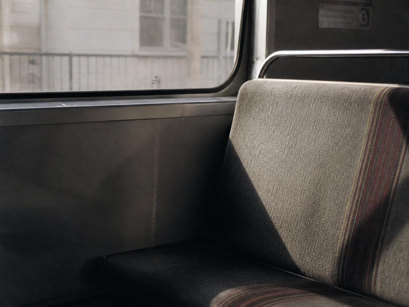 Empty bus seat in afternoon light