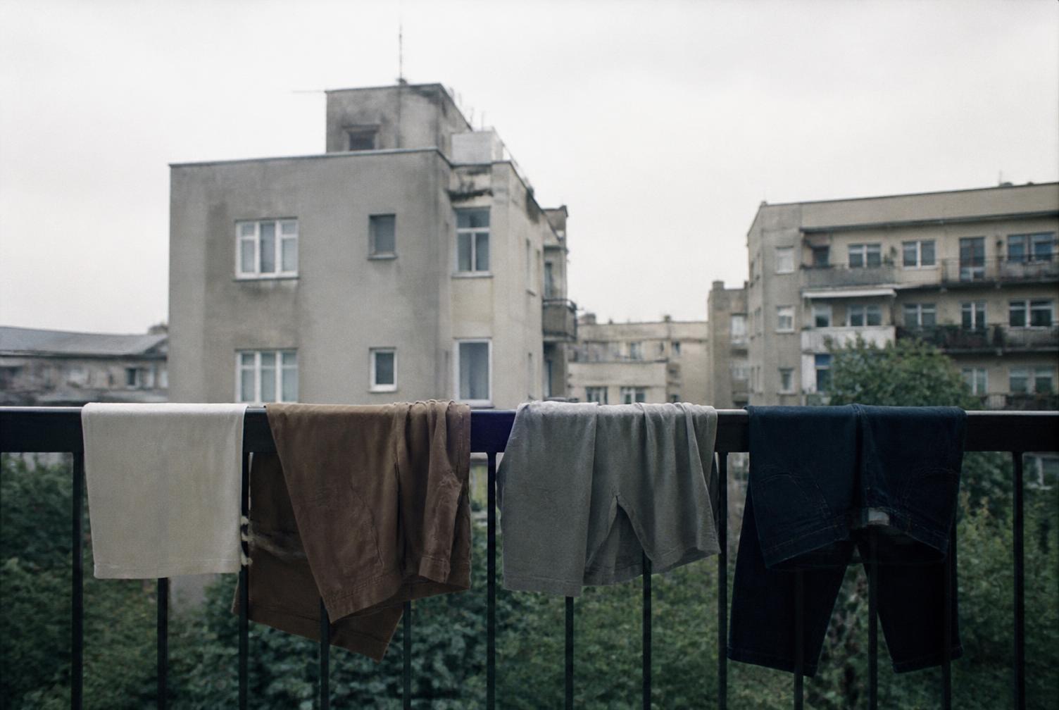 Laundry drying on a balcony rail